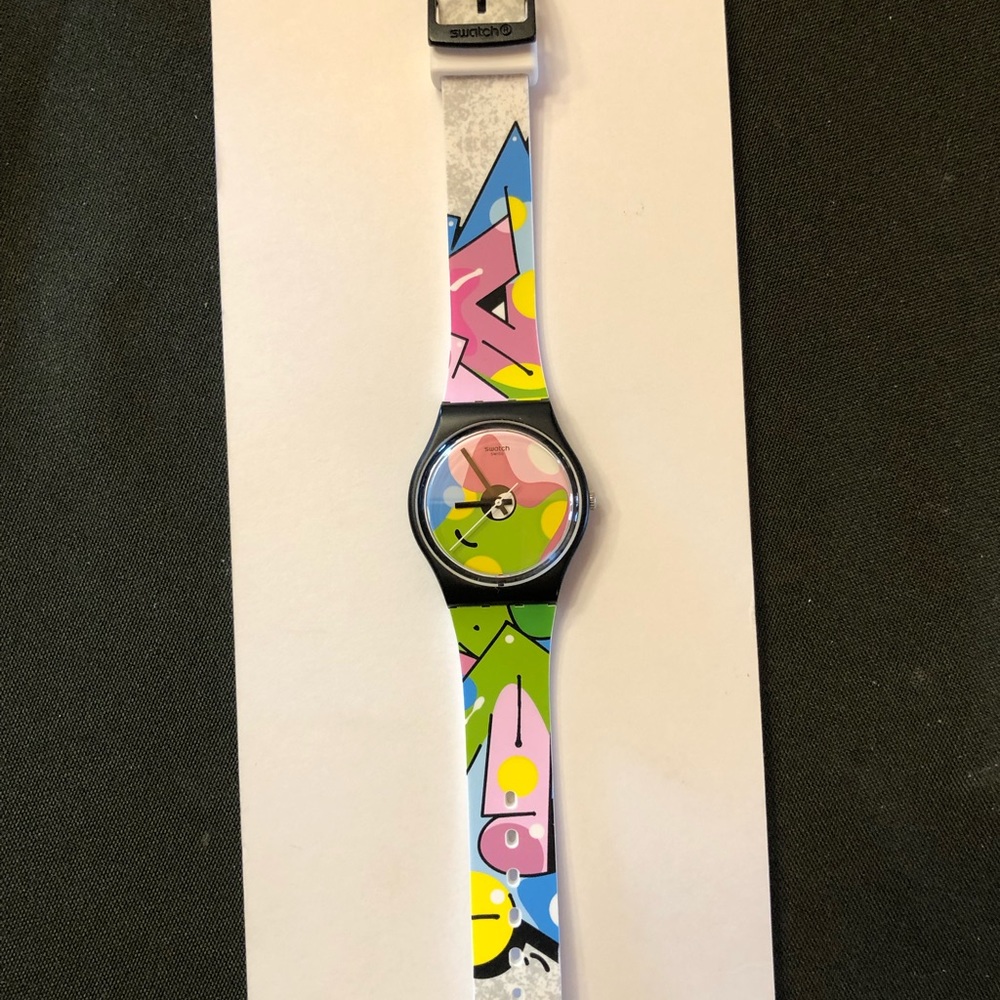 Colorful Swatch watch, pink blue green yellow black- like new condition.